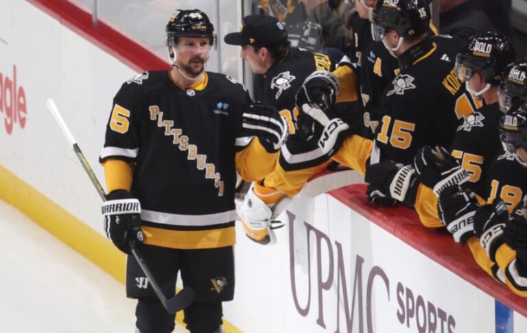 Carter Hart and Erik Karlsson Carter Hart and Erik Karlsson