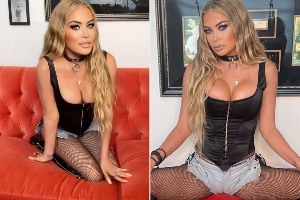 Carmen Electra Sizzles in Sexy Lace-Up Corset and Fishnet Tights