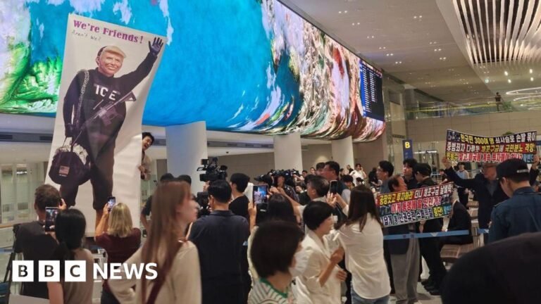 South Korean workers detained in US raid arrive home