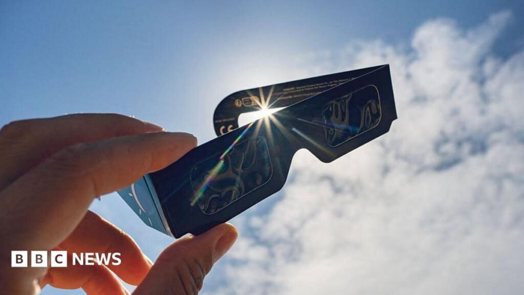 Solar eclipse chasers scramble for glasses as stocks run low