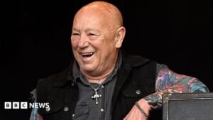 Angry Anderson, who soundtracked Kylie Monigue’s wedding in Neighbours scene, dies aged 79 Angry Anderson, who soundtracked Kylie Monigue’s wedding in Neighbours scene, dies aged 79