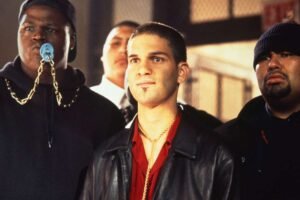 Guillermo Díaz Says “High School High” Costar Louise Fletcher Once Gave Him an ‘Autographed Picture of Her Topless’
