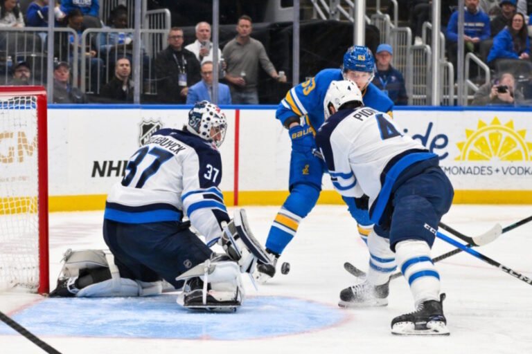 The Latest on Connor Hellebuyck and Dylan Larkin