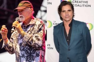 John Stamos Says Beach Boys’ Mike Love, 85, Is ‘Facing Serious Health Challenges,’ but ‘Insists on Being on Stage’